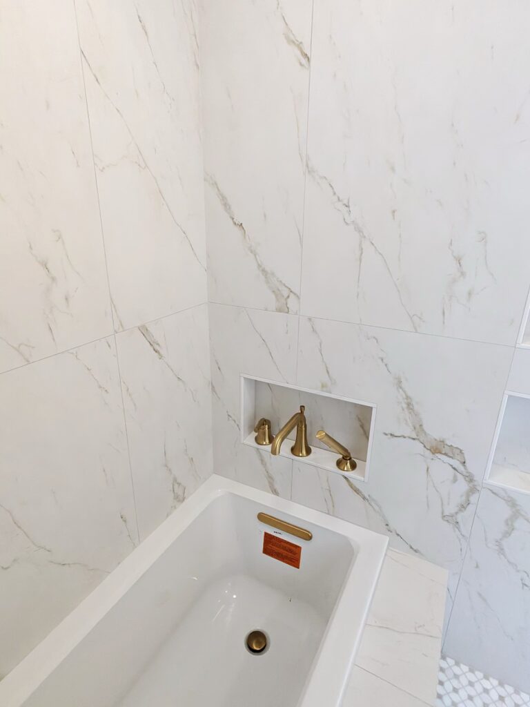 Luxury Bathroom Remodeling in Purchase NY | Custom Bathroom RenovationThis is stronger for Google than making the title purely artistic because it directly targets:Bathroom remodeling
Bathroom renovation
Purchase, NY
Custom/luxury bathroom
SEO Meta DescriptionExplore this custom bathroom renovation in Purchase, NY featuring a luxury wet room, walk-in shower, heated floors, smart toilet, custom vanity, marble-look tile and elegant gold finishes.